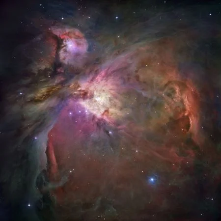 Orion Nebula in visible and infrared light, showing glowing gas and young stars – Hubble mosaic image, 2006